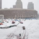 Crews removed snow from City Hall Plaza on Monday ahead of planned victory parade for the Patriots.