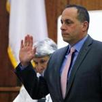 Joseph DiRenzo, a North Attleborough police captain, was sworn in to testify on Wednesday.
