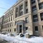 Plans to demolish the Dearborn School have been complicated by a ruling that its history should be saved.  
