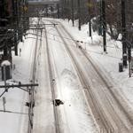 Blue Line tracks in East Boston saw plenty of snow over the weekend.