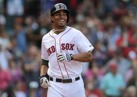 Boston, MA - 09/10/14 - (7th inning) Boston Red Sox shortstop Xander Bogaerts (2) was all smiles as he heads to the Red sox dugout after his solo home run in the seventh inning. The Boston Red Sox take on the Baltimore Orioles in Game 3 of a three game series at Fenway Park. - (Barry Chin/Globe Staff), Section: Sports, Reporter: Peter Abraham, Topic: 11Red Sox-Orioles, LOID: 7.4.1709178026. 
