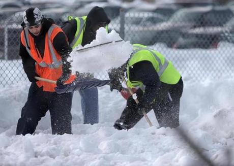 Quincy, MA - 02/17/15 - Crews shovel snow from MBTA Red Line tracks just outside the North Quincy T station Tuesday afternoon, February 17, 2015. Lane Turner/Globe Staff Section: METRO Reporter: typist Slug: 
