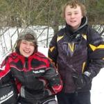 After their snowmobile got stuck in the Maine woods, the boys survived for 14 hours in temperatures that plummeted to 12 degrees below zero.