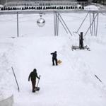 Workers  adjusted the infrastructure that supports the Lawn on D ski slope and groomed the coating of snow on top. The public will be allowed to go tubing duringSlope Fest this weekend. 