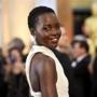 Lupita Nyong'o arrives at the Oscars on Sunday, Feb. 22, 2015, at the Dolby Theatre in Los Angeles. (Photo by Chris Pizzello/Invision/AP)