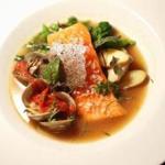 Arctic char in clam and pepper broth with potatoes, greens, basil, mint.