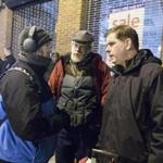 Boston Mayor Martin J. Walsh (right) and Jim Greene, director of Boston?s Emergency Shelter Commission, talked to Edward John Jeske, a homeless man, Wednesday. 