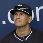 New York Yankees' Alex Rodriguez sits in the dugout during a spring training baseball workout, Thursday, Feb. 26, 2015, in Tampa, Fla. (AP Photo/Lynne Sladky)