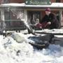  Harry Markarian, who has worked at Sullivan?s for 45 years, cleared snow as the Castle Island eatery opened Saturday.