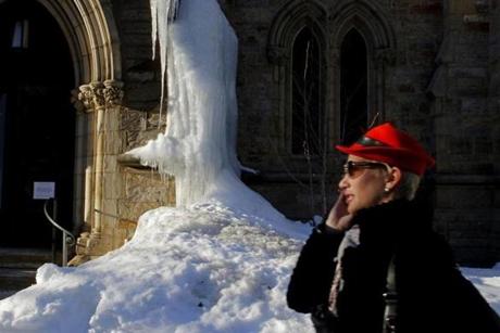 BOSTON Ñ 2/27/2015: An ice dam forms along the walls of Church of the Covenant on Newbury Street. Temperatures remain below average for the month of February. (Sean Proctor/Globe Staff)
