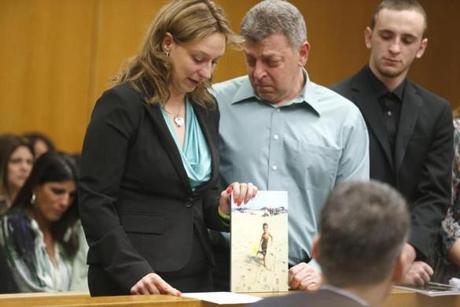 Christine and Ron Holt held a photo of their son Brandon as they made their victim impact statement in a New Jersey court. Brandon was fatally shot by his 4-year-old neighbor, who had found a loaded rifle. Brandon was 6. 
