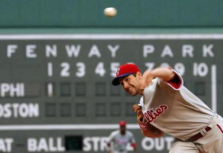 Philadelphia Phillies' Cliff Lee pitches against the Boston Red Sox in the first inning of their MLB interleague baseball game at Fenway Park in Boston, Massachusetts May 28, 2013. REUTERS/Brian Snyder (UNITED STATES - Tags: SPORT BASEBALL)
