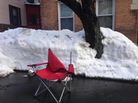 Space savers were back in East Boston by mid-afternoon. 
