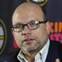 Boston Bruins general manager Peter Chiarelli addresses reporters as he announces trade deadline day transactions in Boston, Monday Feb. 27, 2012. Chiarelli said the Bruins acquired forward Brian Rolston and defenseman Mike Mottau from the New York Islanders in exchange for forward Yannick Riendeau and defenseman Marc Cantin. (AP Photo/Charles Krupa)