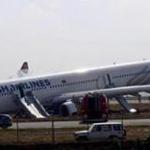 Emergency officials inspected a the Turkish Airlines aurbus after it skidded off a runway in Kathmandu, Nepal.