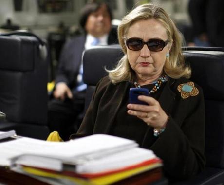 Hillary Rodham Clinton checked for messages during a 2011 flight to Tripoli while she was secretary of state. 
