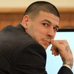 Aaron Hernandez looked at footage of himself from his home security system.