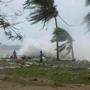Cyclone Pam roiled waves and scattered debris along the coast in the Vanuatu capital of Port Vila.