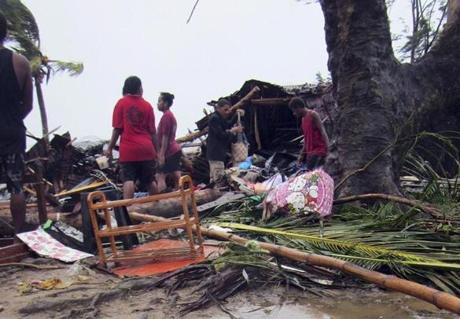 Residents looked through debris in Port Vila, the capital of the Pacific island nation of Vanuatu on Saturday.
