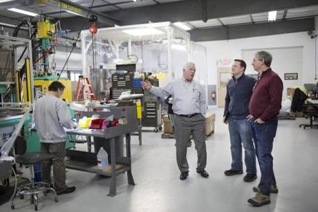 During a tour of Built-Rite Tool & Die, president Craig A. Bovaird (center) spoke with tour organizer Chris Denney and visitor Erik Sobel, a principal at Technology Research Laboratories.
