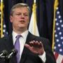 Mass. Gov. Charlie Baker gestures as he unveils his 2016 budget proposal during a news conference at the Statehouse in Boston, Wednesday, March 4, 2015. (AP Photo/Charles Krupa)