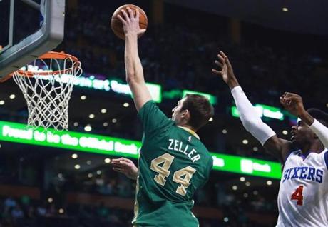 03/16/15: Boston MA: The Celtics Tyler Zeller (44) leaves the 76ers Nerlens Noel (4) behind as he scores two of his game high 26 points, first quarter action. The Boston Celtics hosted the Philadelphia 76ers in a regular season NBA game at the TD Garden. (Globe Staff Photo/Jim Davis) section: sports topic: Celtics-76ers (1)
