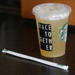 The company began introducing the effort Monday, encouraging its baristas to write ?Race Together? on customers? coffee cups and pushing them to hand out stickers with that slogan.