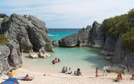 

Warwick Long Bay is just one of the spectacular beaches on Bermuda?s South Shore. // photo by Meredith Andrews

Manning a snow cone stand outside the capital of Hamilton. // photo by Meredith Andrews


St. Peter?s Church, in the colonial town of St. George?s, was founded in 1612, three years after the wreck of the Sea Venture brought Europeans to Bermuda?s shores. // Getty Images

Johnny Barnes blows kisses to commuters. // photo by Matt Dutile

Art Mel?s Spicy Dicy serves what?s been called the best fish sandwich on earth. Have it the Bermudian way with a Barritts ginger beer. // photo by Meredith Andrews


Winding trails in the 64-acre Spittal Pond Nature Reserve lead to picture-perfect views of the island?s South Shore and the Atlantic. // Peter Frank Edwards/Redux


St. George?s Stewart Hall is home to the Bermuda Perfumery and Sweet P?s proper British tea. // photo by chiwun.com

Indulge enjoy some Earl Grey and some treats during afternoon tea at Sweet P in the garden of the Bermuda Perfumery. // photos by chiwun.com

The Dark ?n? Stormy is Bermuda?s national drink. /// Peter Frank Edwards/Redux


Lined with shops, bustling Front Street runs along Hamilton Harbor. // Peter Frank Edwards/Redux

The posh Fairmont Hamilton Princess is just completing a multimillion-dollar renovation. // no photo credit

A scooter may be a good choice for getting around since you can?t rent a car in Bermuda. // Peter Frank Edwards/Redux


Cricket is a national obsession in Bermuda. // photograph from Bermuda Tourism Authority



