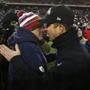 New England Patriots head coach Bill Belichick, left, and Baltimore Ravens head coach John Harbaugh after an NFL divisional playoff football game Saturday, Jan. 10, 2015, in Foxborough, Mass. The Patriots won 35-31 to advance to the AFC Championship game. (AP Photo/Elise Amendola)