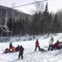 People were attended to after the ski lift accident Saturday at Sugarloaf Mountain Resort in Maine. 