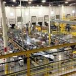 The Amazon distribution center in Tracy, California, was opened in 2013 and refitted to use robot technology in 2014.