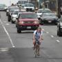 BOSTON ,MA 09 / 18/ 2012: Is it safe for bicylists in Boston?......not a good idea to ride outside the bike lane in traffic...like this on Commonwealth Avenue, Boston ( David L Ryan / Globe Staff Photo ) SECTION: METRO TOPIC 19bikes