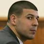 Aaron Hernandez (left) listened during a motion regarding jail phone recordings during his murder trial.