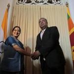 Indian Foreign Minister Sushma Swaraj shook hands with her Sri Lankan counterpart, Mangla Samaraweera, in Colombo, Sri Lanka.