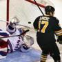 Boston-03/28/15- Boston Bruins vs NY Rangers- Bruins Milan Lucic's goal soars over the head of Rangers goalie Henrik Lundqvist in the 1st period after the ref 1st called no goal, but under review the call of a goal was made. Boston Globe staff photo by John Tlumacki (sports)