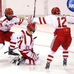 Matt Lane (center) is the center of the celebration after scoring in the second period for BU.