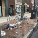 Damaged bikes and bike racks could be seen in Cambridge.