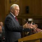Mike Pence held a press conference Tuesday at the Indiana State Library in Indianapolis.