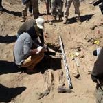 Members of a forensic team worked Tuesday at a Tikrit site believed to be a mass grave.