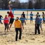 South Boston-04/11/15- Volleyball players on recreational teams took advantage of the warm temperature to play on Carson Beach. Boston Globe staff photo by John Tlumacki (metro)