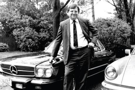 Charles Howard posed with his sports cars at his Bedford, N.H. home in 1984. 
