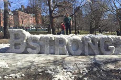 George Li turned dirt-sprinkled ice mounds into a sculpture that read ?B Strong.?
