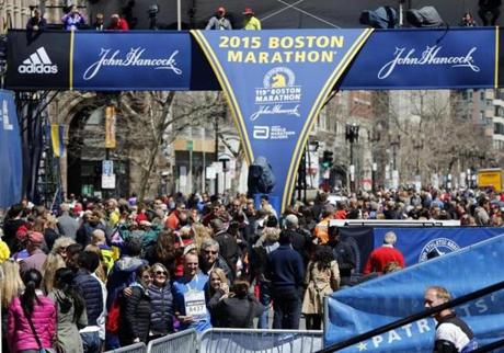 Runners and spectators crowded the finish line on Boyston Street on Sunday.
