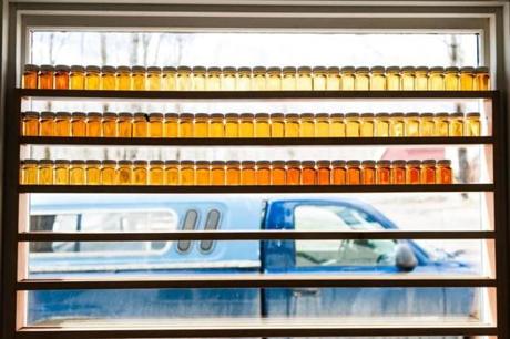Grades of maple syrup were lined up in a window at Marvin?s sugarhouse in Johnson, Vt., last week.
