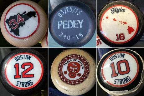 Clockwise from top left are the bats of David Ortiz, Dustin Pedroia, Shane Victorino, Ryan Hanigan, Pablo Sandoval, and Mike Napoli.
