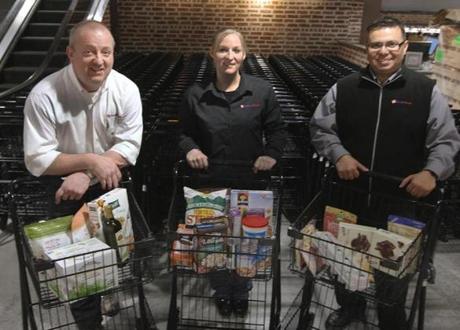 From left: Store manager Larry Baxter with assistant managers Krystle Bredeson and Marvin Alvarez at the new Roche Brothers supermarket in Downtown Crossing on April 23.
