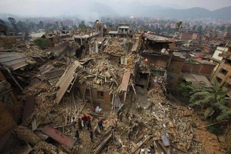 Rescue workers removed debris as they searched for victims of earthquake in Bhaktapur near Kathmandu.
