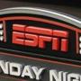 This Sept. 16, 2013 photo shows the ESPN logo prior to an NFL football game between the Cincinnati Bengals and the Pittsburgh Steelers, in Cincinnati. ESPN on Monday, April 27, 2015 filed a lawsuit against Verizon in an escalating clash over how the popular sports channel is being sold in a discounted pay-TV package. (AP Photo/David Kohl)