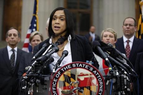 Marilyn Mosby, Baltimore state's attorney, announced criminal charges against all six officers suspended in the Freddie Gray case.
