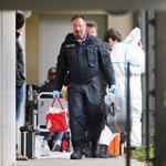 German police officers secured evidence in front of an apartment in Oberursel, Germany, on Thursday.